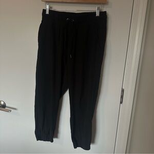 Kyodan black athletic joggers. Size M